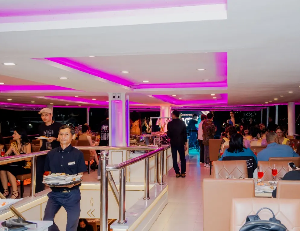 Live stage performance with vibrant lights onboard Meridian Cruise 2